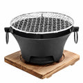 Zoe KL1 Portable Charcoal Grill Mini Tabletop BBQ Cast Iron Body Stainless Steel Removable Grill Net Heat-Resistant Wooden Base Silver Carry Rings Outdoor Picnic and Backyard Cooking